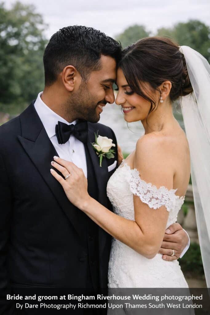Bride and groom at Bingham Riverhouse wedding in Richmond upon Thames photographed by Dare Photography, affordable wedding photographer in South West London